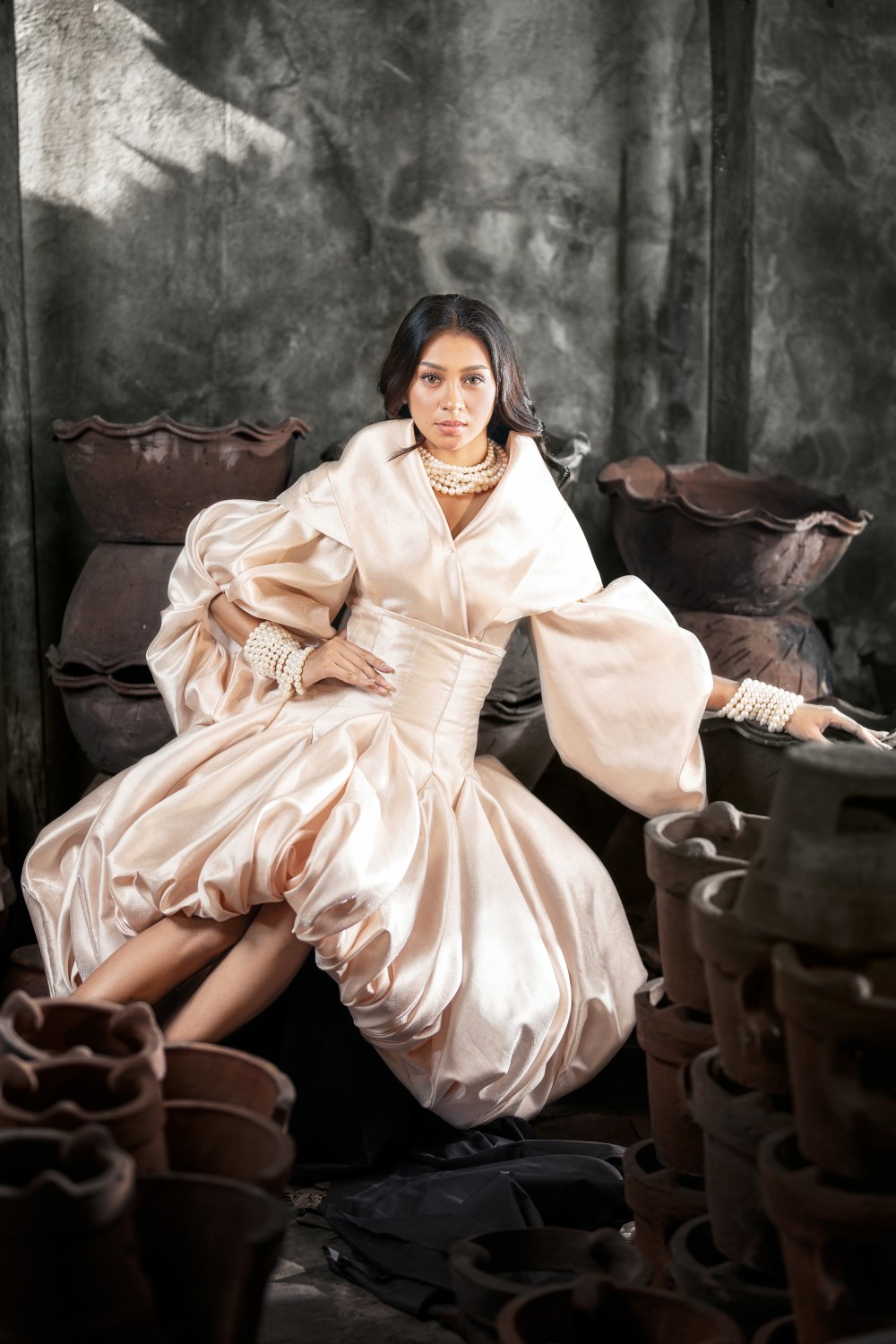 Golden Isles Pearl Filipiniana dress with light-toned finish, voluminous sleeves, defined waist, and pearl accessories