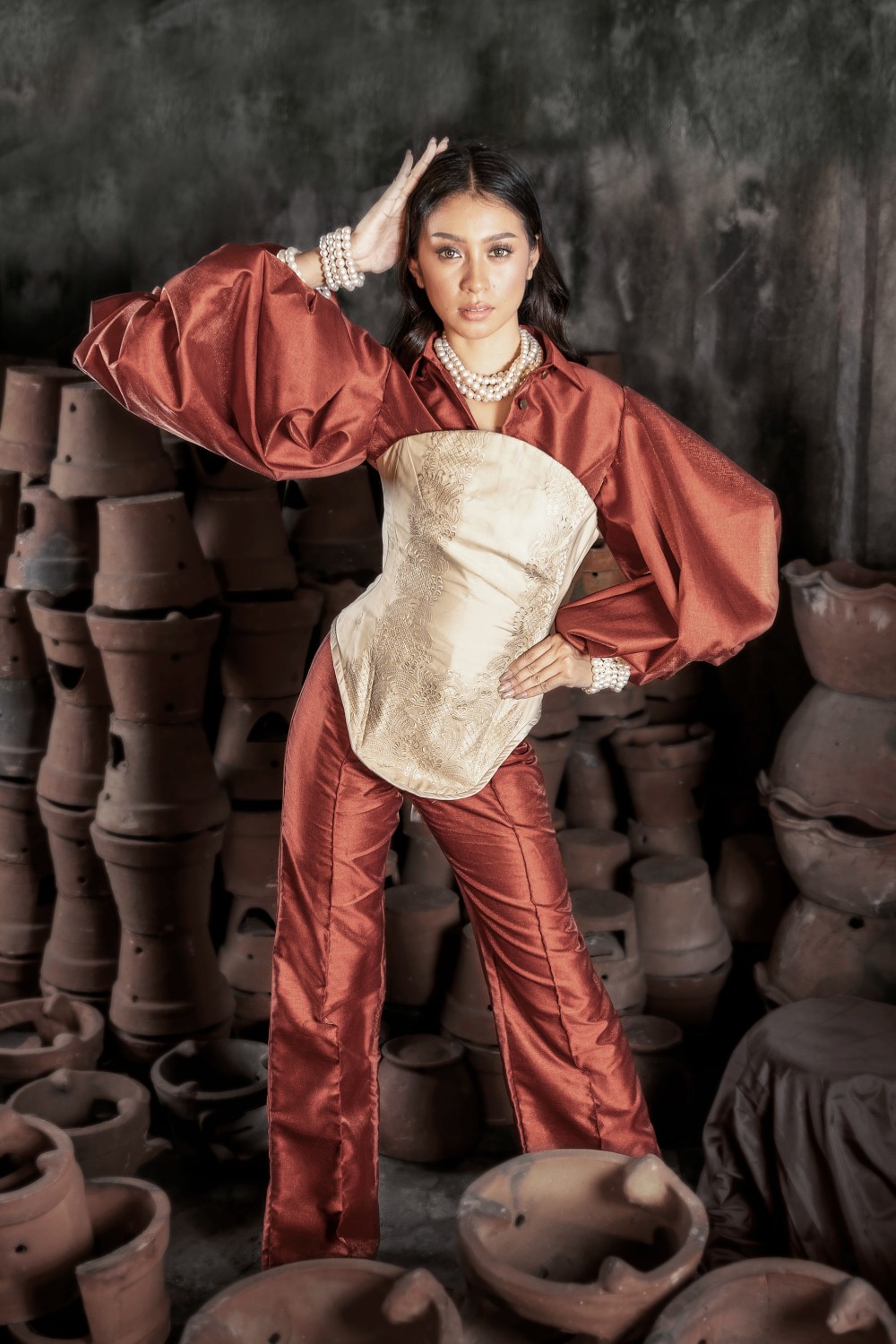 Scarlet Terno modern Filipiniana couture with red sleeves, fitted embroidered bodice, and pearl accessories