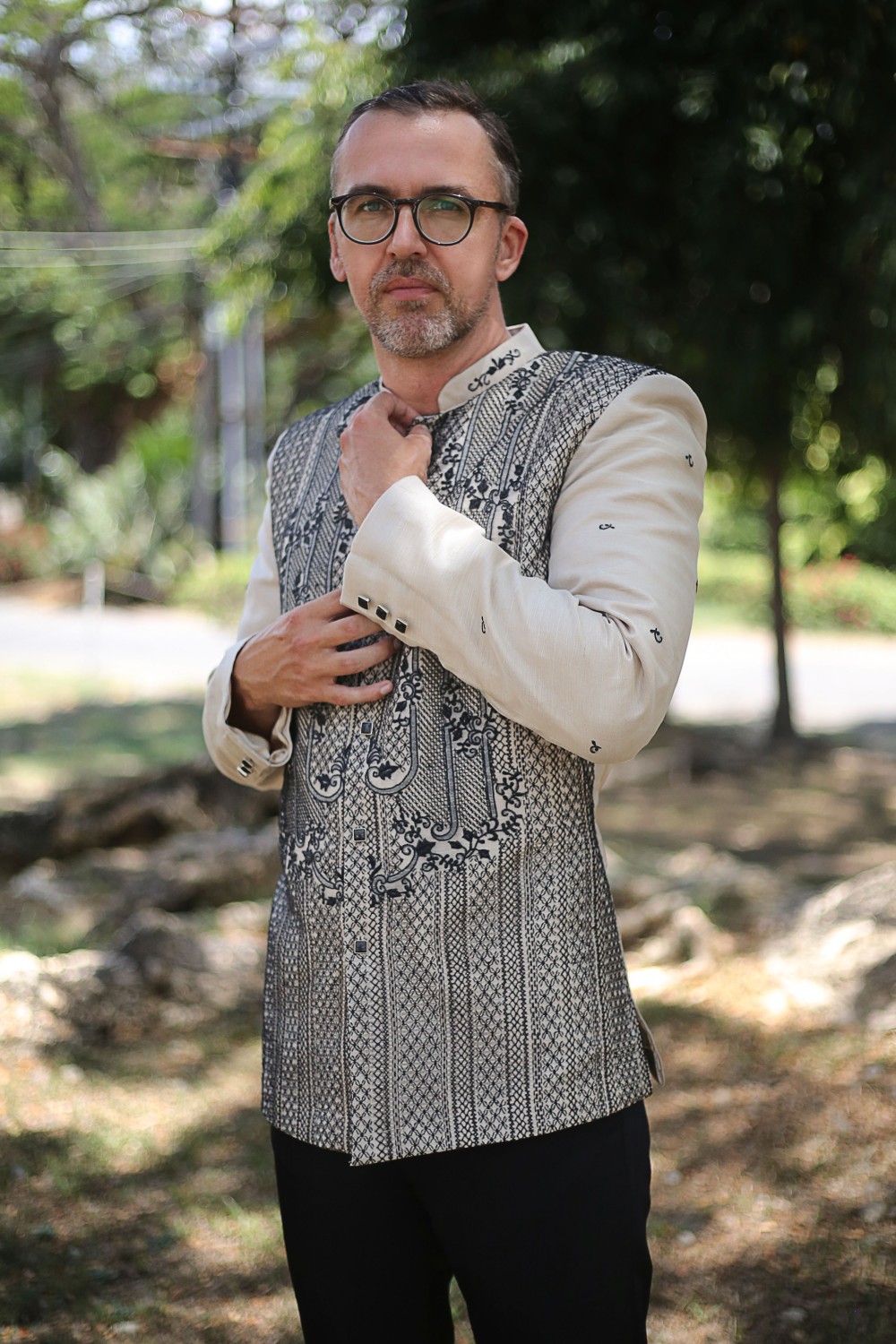 Custom Barong Tagalog for a wedding groom with black detailing and cream sleeves
