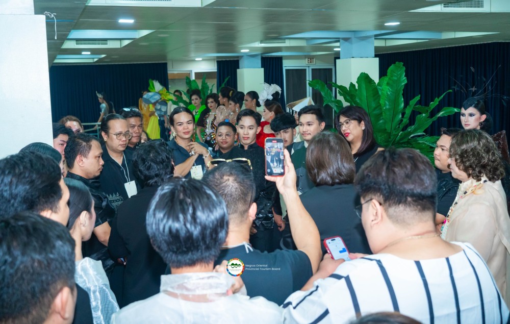 Cary Santiago sharing remarks with designers ahead of the TerN.O runway presentations at Buglasan Festival 2025