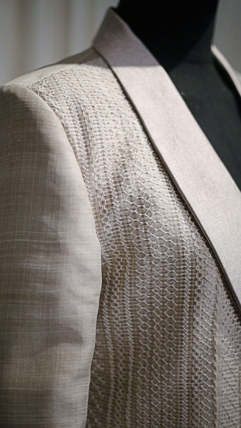 Close-up of calado embroidery on pi&ntilde;a cocoon silk barong with openwork lattice and hand-finished detailing